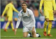  ?? AFP ?? Cristiano Ronaldo reacts after missing a goal opportunit­y against Villarreal during a La Liga match. —