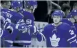  ?? VERONICA HENRI/ POSTMEDIA NETWORK ?? William Nylander, right, and the Leafs celebrate the forward’s second goal of the game in the Leafs’ win over the Tampa Bay Lightning on Monday.
