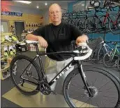  ?? PETE BANNAN – DIGITAL FIRST MEDIA ?? Bike Line owner John Graves has sold his business to Trek Bicycle.