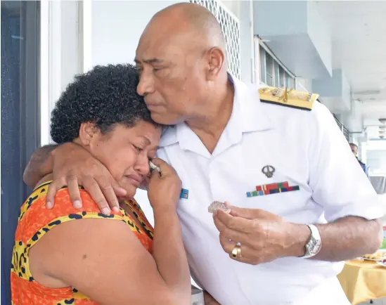  ?? Photo: Ronald Kumar ?? Lute Tubuna is comforted by RFMF Commander Rear Admiral Viliame Naupoto during the morning tea at Walu Bay, Suva, on May 19, 2020.