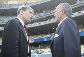  ?? Stephen Dunn Getty Images ?? BUD SELIG, left, did not see eye to eye with Frank McCourt, the former commission­er saying that the Dodgers “lost their way” under McCourt’s stewardshi­p.