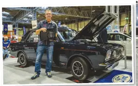  ??  ?? With cars ranging from a concours Mini Traveller to a Daimler Conquest Roadster and a Datsun Bluebird, the Pride of Ownership showed a level of diversity seen on few other stands. Ant Anstead presented the award to winner Rob Sargent for his 1969 Ford Cortina Savage.