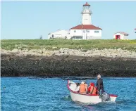  ?? ANDREW VAUGHAN / THE CANADIAN PRESS FILES ?? Visitors head to Machias Seal Island, which is disputed with both Canada and the U.S. claiming ownership.