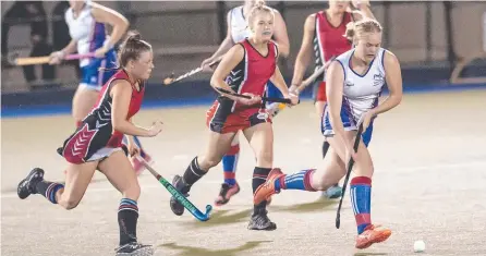  ?? Picture: Nev Madsen. ?? RISING STAR: Tatum Stewart (right) played a key role in Rangeville’s Women’s A1 hockey grand final win.