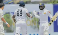  ??  ?? Angelo Mathews and Dhananjaya de Silva took Sri Lanka home