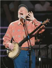  ?? EVAN AGOSTINI/AP 2009 ?? Pete Seeger has become the latest American musician to appear on a U.S. postage stamp.