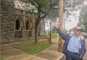  ?? Kenneth C. Crowe II / Times Union ?? Cohoes City Engineer Gary Nathan points to damage at the Cohoes Public Library on Friday. Engineers will assess the damage next week.