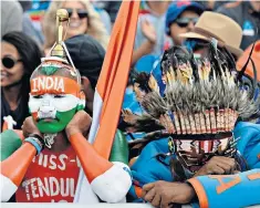  ??  ?? India fans were disappoint­ed after they were beaten in the semi-final by New Zealand