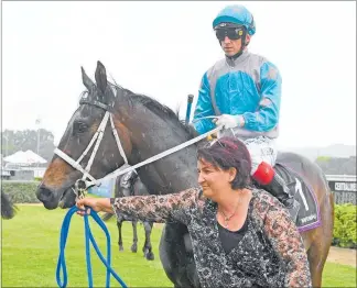  ??  ?? LEFT: Trainer Kirsty Lawrence leads Real Slim Tradie back to the winner’s stall following the horse’s game maiden victory at Hastings last Sunday. TOP: The connection­s of Real Slim Tradie show their elation following the horse’s success at Hastings last Sunday. ABOVE RIGHT: Hastings-trained Basarwa and jockey Vinnie Colgan cross the line for a decisive 11⁄ length win in a maiden 4 1200m race at Hastings last Sunday.