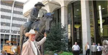  ?? Steve Lackmeyer / The Oklahoman file ?? James F. Cotter attends the 2009 unveiling of a sculpture showing him on horseback at Cotter Ranch Tower in Oklahoma City.