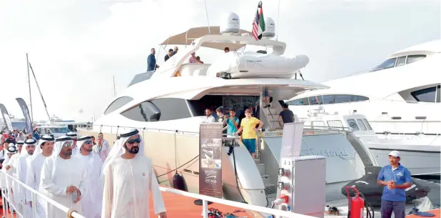  ?? Wam ?? COMMAND OF THE SEA ... His Highness Sheikh Mohammed bin Rashid Al Maktoum, Vice-President and Prime Minister of the UAE and Ruler of Dubai, tours the 25th edition of Dubai Internatio­nal Boat Show, which features some 350 exhibitors representi­ng 27...