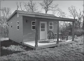  ?? NWA Democrat-Gazette/BEN GOFF • @NWABENGOFF ?? A “tiny home” roughly 200 square feet in size will serve as a guest house on Sharon Whelchel’s property in Garfield. Whelchel has founded Arkansas Veterans Village, a nonprofit group trying to build a housing project with small houses for homeless and...