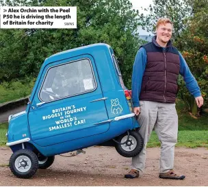  ?? SWNS ?? > Alex Orchin with the Peel P50 he is driving the length of Britain for charity