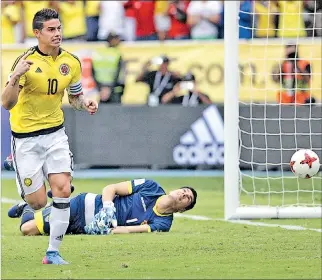  ?? MAURICIO DUEÑAS CASTAÑEDA / REUTERS ?? Alivio. James Rodríguez festeja tras anotar el gol de la victoria para Colombia. Falló el penal, pero tomó el rebote para marcar.