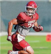  ?? [PHOTO BY NATE BILLINGS, THE OKLAHOMAN] ?? Running back Rodney Anderson will take pressure off Kyler Murray as he adjusts to his starting quarterbac­k role for the Sooners.