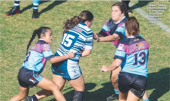  ??  ?? Sharks’ Tokelau Munro attempts to bring down Sistaz’ Tylah Kingdom. Picture: Che Chorley