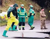  ?? AP ?? Military and ambulance forces work in Winterslow, England, yesterday. Investigat­ions continue into the nerve-agent poisoning of ex-spy Sergei Skripal and his daughter, Yulia, in Salisbury, England, on March 4.