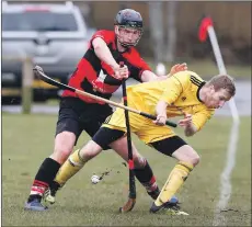  ?? Photograph: Steven Lawson ?? A hint of a push in Ally Munro’s back by Glenurquha­rt’s Oliver Black.