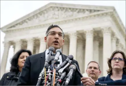  ?? ANDREW HARNIK — ASSOCIATED PRESS ?? Neal Katyal, the attorney who argued against the Trump administra­tion in the case, speaks to reporters outside the Supreme Court on Wednesday.