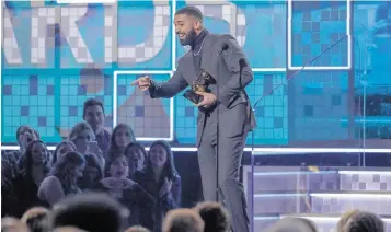  ?? ROBERT GAUTHIER Los Angeles Times/TNS, file ?? Drake accepts the award for Best Rap Song during the 61st Grammy Awards at Staples Center in Los Angeles on Feb. 10, 2019. Drake released ‘Honestly, Nevermind,’ his seventh studio album, on June 17.