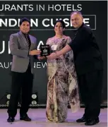  ?? ?? HE Dr Roger Gopaul with Ms Benita Sharma, General Manager, ITC Maurya New Delhi with team Bukhara, the winner of Best Indian Cuisine.