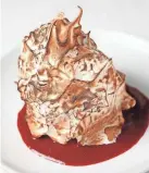  ?? BRYAN TERRY/THE OKLAHOMAN ?? A Baked Alaska at Steak the Experience in Oklahoma City, on March 16.