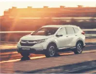  ?? FOTO: HONDA ?? Der CR-V mit Hybridantr­ieb gibt auf Wunsch Rückmeldun­g zum sparsamen Fahren.