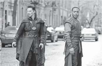  ??  ?? Doctor Strange (Benedict Cumberbatc­h) and Karl Mordo (Chiwetel Ejiofor) prepare for battle on the streets of New York, where their foes are getting ready to fold buildings around them. MARVEL