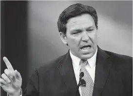 ?? JOHN RAOUX/AP ?? Florida Gov. Ron DeSantis, seen in February speaking at the Conservati­ve Political Action Conference in Orlando, Fla., may be contemplat­ing a run for president in 2024.