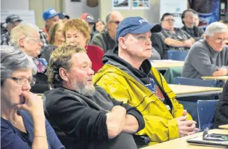  ??  ?? People who attended an open house by Cermaq in Digby on Jan. 15 listened to what the company was saying but also raised many questions and concerns.