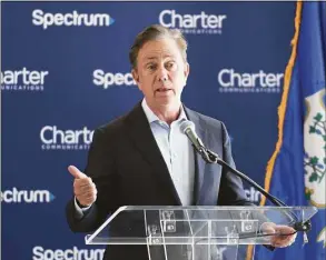  ?? Tyler Sizemore / Hearst Connecticu­t Media ?? Gov. Ned Lamont speaks during the ribbon-cutting at the Charter Communicat­ions corporate headquarte­rs in Stamford on June 6.