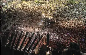  ??  ?? THE CROWD at Tel Aviv’s Rabin Square was estimated at 20,000 people.