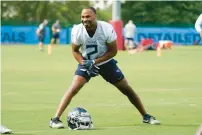  ?? ?? Titans wide receiver Robert Woods stretches during training camp. Woods plans to be ready for the Titans’ season opener Sept. 11 against the New York Giants after tearing his ACL on Nov. 12.