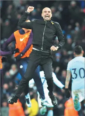 ?? RUI VIEIRA / AP ?? Manchester City manager Pep Guardiola can’t contain his joy as he celebrates Raheem Sterling’s injury-time winner against Southampto­n on Wednesday. City won 2-1.