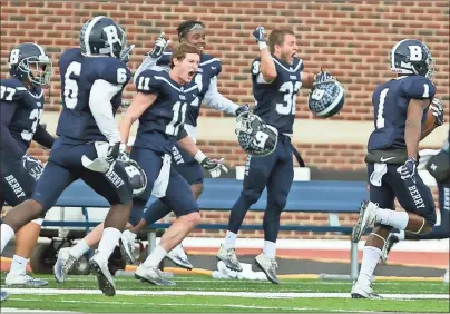  ?? Steven Eckhoff / RN-T ?? Berry College’s sideline cheers as C.J. Stone (1) runs for a 90-yard kickoff return for a touchdown against Huntingdon during the second quarter of Saturday’s NCAA Division III playoff game at Valhalla. Berry won 34-20.