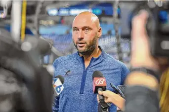  ?? Eric Espada/TNS ?? Former Marlins CEO Derek Jeter speaks to the media before the start of the game against the Phillies at loanDepot park in 2021, in Miami,