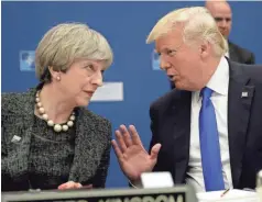  ??  ?? President Trump and British Prime Minister Theresa May speak at the NATO summit in Brussels on May 25. POOL PHOTO BY MATT DUNHAM