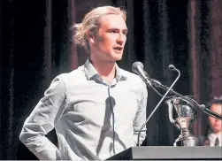  ?? PHOTO/FILE ?? Cyclist Regan Gough spends almost as much time collecting awards as he does training on his bike.