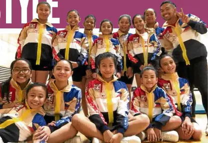  ??  ?? The San Beda Alabang Midgets cheerleadi­ng squad with coach Ajjie Mendelebar during their first day in Japan
