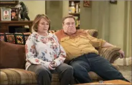  ?? ADAM ROSE — ABC VIA AP ?? In this image released by ABC, Roseanne Barr, left, and John Goodman appear in a scene from the reboot of “Roseanne,” premiering on Tuesday at 8 p.m. EST.