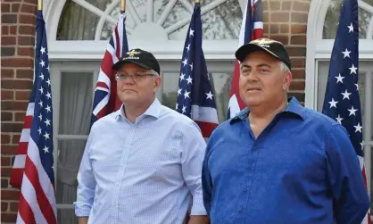  ??  ?? Prime minister Scott Morrison and Australia’s ambassador to the US Joe Hockey speak in Washington in September. Hockey has rejected the characteri­sation of Alexander Downer as a diplomat by Republican Lindsey Graham. Photograph: Mick Tsikas/AAP
