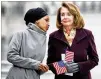  ?? TOM BRENNER / NEW YORK TIMES ?? Rep. Ilhan Omar (left) talks with House Speaker Nancy Pelosi at a Friday news conference on H.R. 1 in D.C.