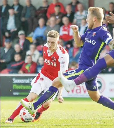  ??  ?? THE HUNTED: Charlton’s defence is bamboozled by Fleetwood’s Ashley Hunter