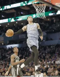  ?? AP FOTO ?? REVENGE. Kyle Kuzma and the US team avenge its 31-point loss last year with a 161-144 rout of the World team in the NBA All-Star challenge.