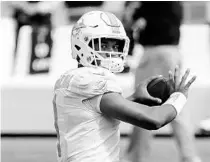  ?? WINSLOW TOWNSON/AP ?? Miami Dolphins quarterbac­k Tua Tagovailoa before a game against the New England Patriots at Gillette Stadium on Sunday, in Foxborough, Mass.