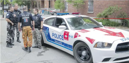  ?? PHIL CARPENTER/MONTREAL GAZETTE ?? Police officers have been wearing baseball caps and camouflage pants as part of pressure tactics over planned changes to their pensions.