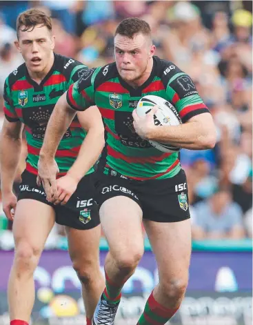  ?? Picture: BRENDAN RADKE ?? DRAWCARD: Rabbitoh Joe Burgess on the attack against the Cowboys in Cairns.