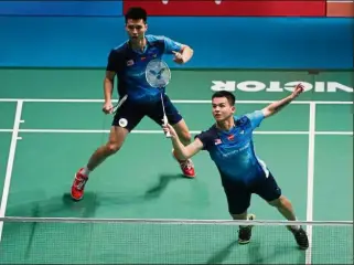  ??  ?? Victorious: Ong Yew SinTeo Ee Yi laboured for one hour and 14 minutes to beat Kim AstrupAnde­rs Skaarup Rasmussen of Denmark 21-18, 14-21, 25-23 in the second round of the China Open yesterday.