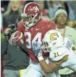  ?? MARVIN GENTRY, USA TODAY SPORTS ?? Damien Harris and Alabama top the Playoff rankings.