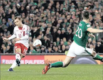  ?? PICTURE: REUTERS ?? ON TARGET: Christian Eriksen scores Denmark’s second goal during last night’s World Cup qualificat­ion play-off second leg against Republic of Ireland in Dublin.